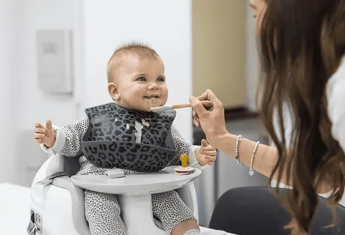 baby feeding time with staff